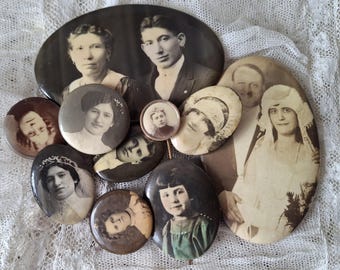 May include: A collection of antique oval and circular portraits in sepia tones. The portraits feature individuals and couples, with varying sizes and shapes. The images are arranged on a white lace surface, creating a vintage aesthetic.