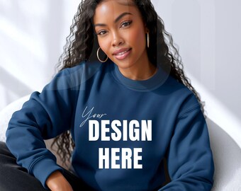 May include: A navy blue sweatshirt with the text "Your DESIGN HERE" in white. The sweatshirt is a crew neck style and appears to be made of a soft material. The image shows a person wearing the sweatshirt.