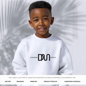 May include: A young person wearing a white sweatshirt with the text "DIAMOND MOCKS" in black. The image is suitable for personal and commercial use. The sweatshirt is a mock-up for branding, websites, product displays, and marketing materials.