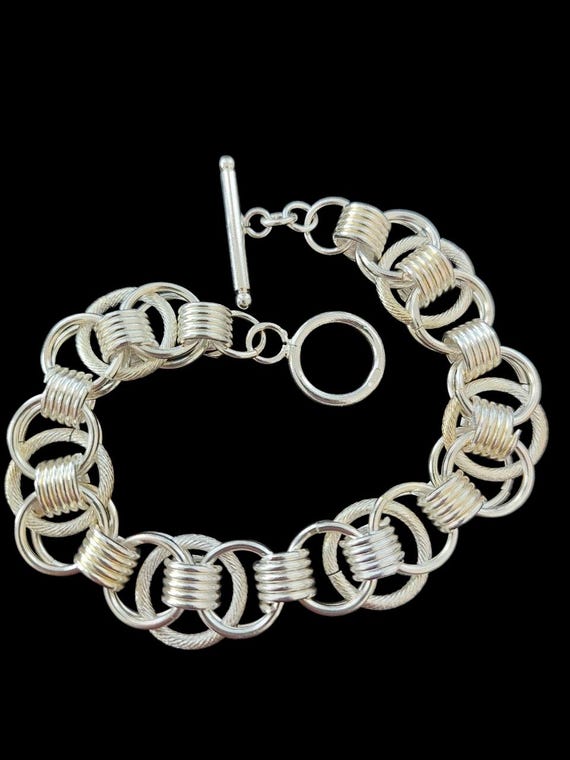 Silver Interlocking Links Bracelet - image 1
