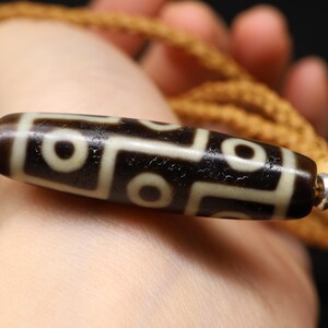 Perlina Dzi tibetana a 9 occhi