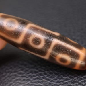 Perlina Dzi tibetana a 9 occhi