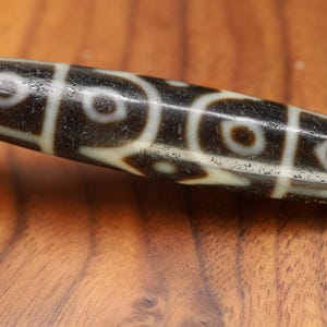 Powerful Ancient 12-Eye Dzi: Amulet of Enlightenment