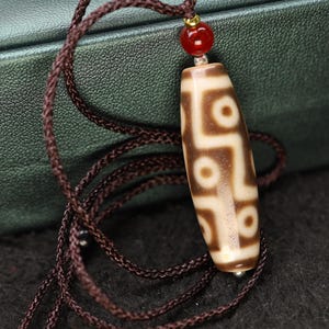 Perlina Dzi tibetana a 9 occhi