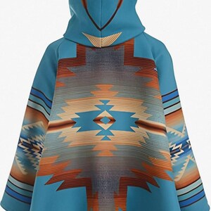May include: A turquoise hooded poncho with a Southwestern-inspired geometric pattern in shades of orange, tan, and blue. The poncho features a hood with decorative accents and a flowing silhouette, suitable for cool weather.