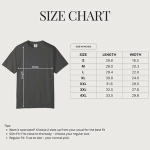 May include: A size chart for a dark gray t-shirt, with measurements in inches. The chart includes sizes S to 4XL, with corresponding length and width measurements. The text "SIZE CHART" is at the top.