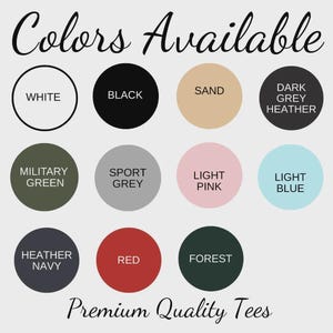 May include: A color chart for t-shirts featuring the text Colors Available and Premium Quality Tees. It displays eleven circular swatches labeled White, Black, Sand, Dark Grey Heather, Military Green, Sport Grey, Light Pink, Light Blue, Heather Navy, Red, and Forest.