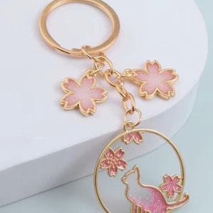 Llavero de gato adorable: llavero redondo con forma de animal para mujeres y niñas. Abalorio para bolso de gato kawaii, accesorio para bolso, regalo de amistad.