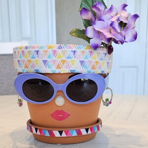 Diadema multicolor de señora maceta