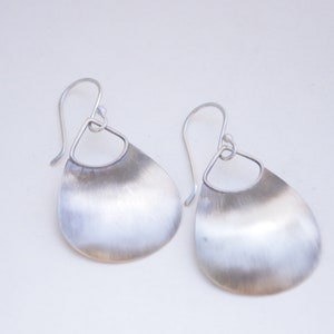 Silver domed earrings in purse like shape
