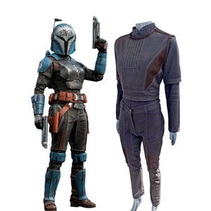 May include: A white ceramic mug with a black handle and the text "But First, Coffee" in a black, handwritten-style font. The mug is on a white surface.