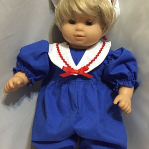 traje de muñeca