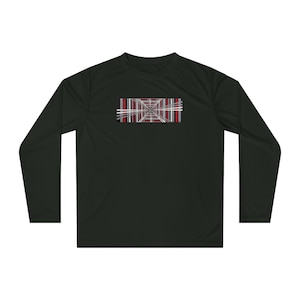 May include: Black long-sleeve shirt with a geometric design. The design is a rectangular pattern of intersecting lines in red, white, and gray. The shirt is made of a smooth, likely athletic material.