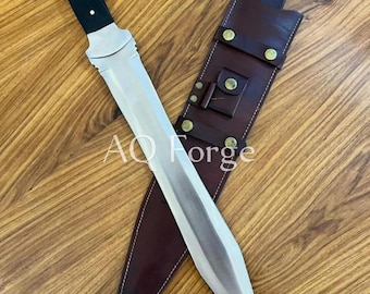 Espada de caza de acero al carbono de doble filo, hecha a mano, de 27 pulgadas de largo, de espiga completa, con funda de cuero.