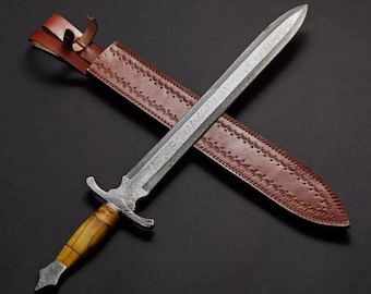 Espada vikinga de doble filo de acero de Damasco hecha a mano, con empuñadura de madera de olivo y funda de cuero.