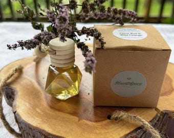 Difusor de aromaterapia con aceites esenciales para coche