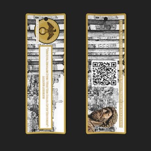 May include: Two rectangular bookmarks with gold trim. One features a gold eagle emblem and text: "The soul brookes died when the color of its thoughts." The other has a QR code and text: "Join the Aurelius Journals community for weekly prompts for your journey."