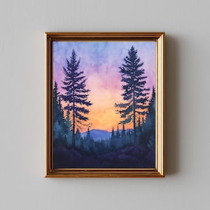 May include: Watercolor painting of a forest scene with two tall pine trees in the foreground. The sky transitions from purple to orange, with a mountain range in the distance. The artwork is framed in a gold-colored frame.