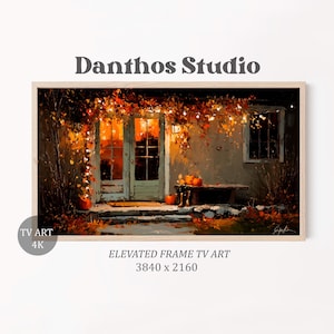 Op de afbeelding: Een digitaal schilderij van een huis aan de buitenkant in de herfst, met een verlichte deuropening en raam. Het kunstwerk gebruikt warme kleuren, pompoenen en de tekst "Danthos Studio" en "ELEVATED FRAME TV ART".
