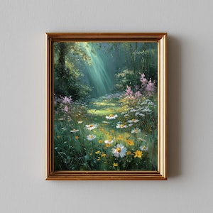 May include: A framed painting depicts a sunlit forest path. The artwork features a vibrant meadow of white and yellow daisies, with pink and purple wildflowers. The gold frame adds a touch of elegance to the nature-themed art.