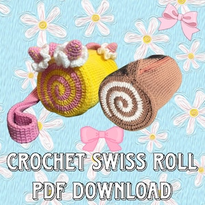 May include: Crocheted Swiss roll purse and a Swiss roll-shaped zippered pouch. The purse is yellow with pink and white accents, and a pink strap. The pouch is brown with a white spiral design. The background is light blue with white flowers and pink bows.