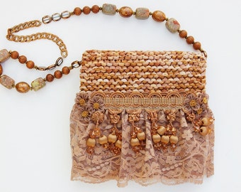 Caramel Lace - camel knitted purse with lace, braiding and hanging beads.