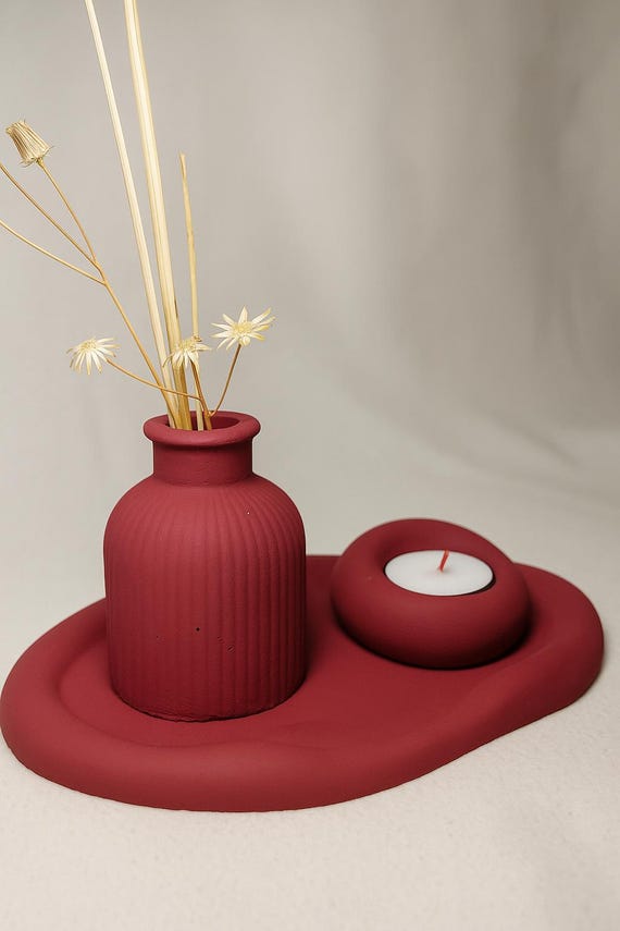 Set of vase, tray, and candle holder made of white cement. Aesthetic home decor. The difference is in how it's created.