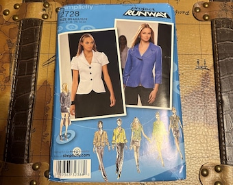 May include: A Simplicity sewing pattern, size D5, featuring images of women's jackets and the text "Project Runway". The pattern includes sizes 4, 6, 8, 10, and 12. The pattern is on a blue background.