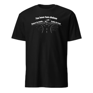 May include: Black t-shirt with a white graphic. The graphic features a road splitting into two paths, with the text "You have two choices" above. One path says "Return to monke" and the other says "Evolve to crab".