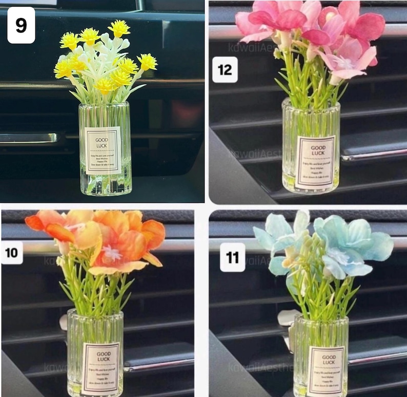 May include: Four small glass vases, each containing artificial flowers. The flowers are yellow, pink, orange, and blue. Each vase has a label that reads "GOOD LUCK". The vases are designed to be placed in a car's air vent.