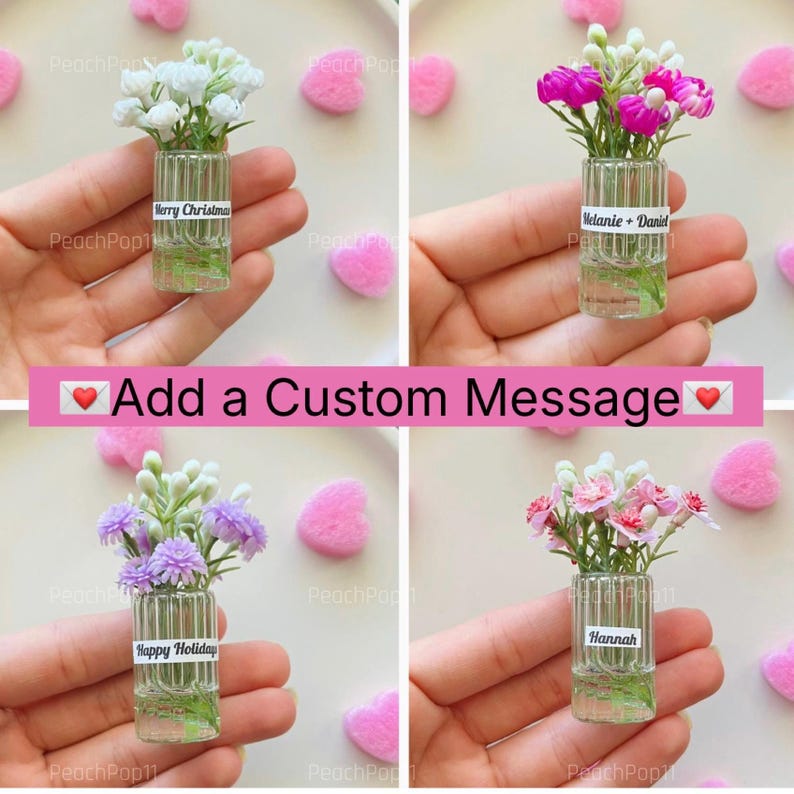May include: Four miniature glass vases, each holding a different arrangement of tiny flowers. Each vase has a label with a custom message. The text "Add a Custom Message" is displayed on a pink banner. Pink heart-shaped decorations are scattered around.