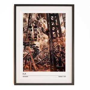May include: Framed art print depicting a roller coaster with industrial details, rendered in brown and grey tones. The print includes the text "F.L.Y." and "Phantasialand" at the bottom. The artwork is presented in a black frame.