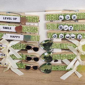Decorated sports cheer clothespins
