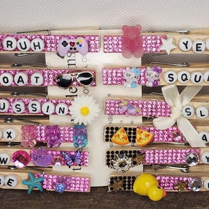 Decorated sports cheer clothespins