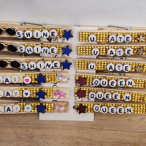 Decorated sports cheer clothespins