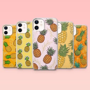 May include: Five phone cases with pineapple patterns. The cases display repeating pineapple designs on yellow, orange, and pink backgrounds. Each case has a clear border and a camera cutout.