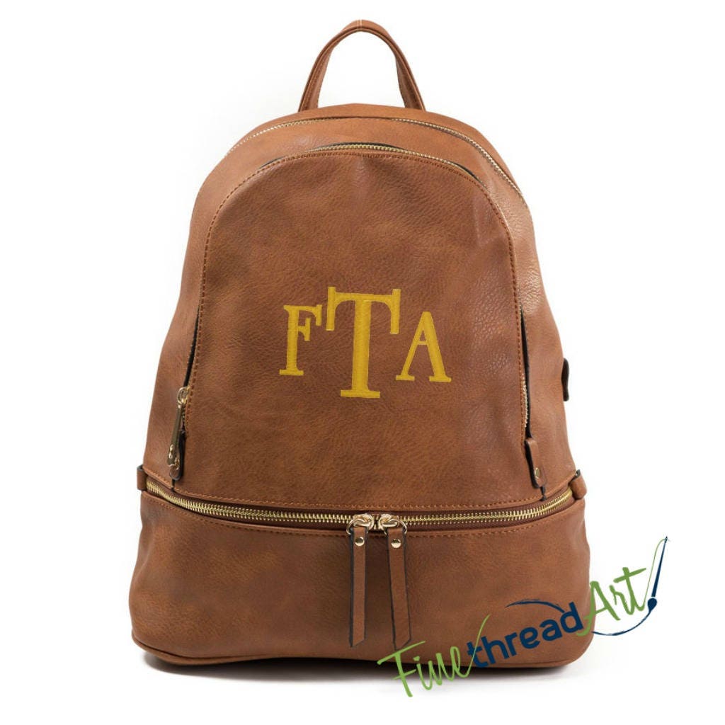 cognac backpack purse