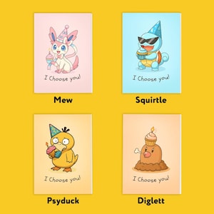 May include: Four colourful art prints showcasing cartoon characters with cupcakes and party hats. The prints feature Mew, Squirtle, Psyduck, and Diglett, with the text "I Choose you!" beneath each character.