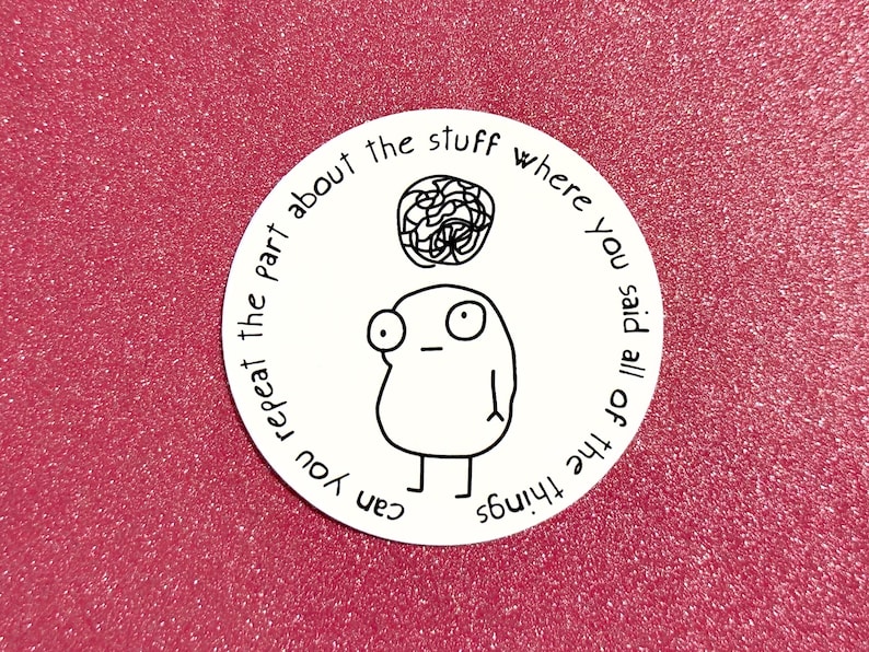May include: A white sticker with a cartoon figure and the text "Can you repeat the part about the stuff where you said all of the things" in a circular design. The background is a sparkly pink.