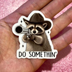 Tu was, Lustiges Trend-Meme, Süßer Waschbär-Cowboy, Sarkastische psychische Gesundheit, Schwarzer Humor, Planer