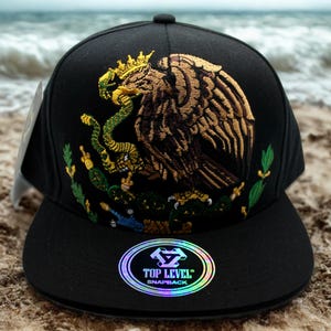 Mexican Eagle Snapback Hat – Black Flat Bill Cap with Gold Crowned Eagle and Serpent – Adjustable Patriotic Mexico Cap– Mexican Inspired Cap