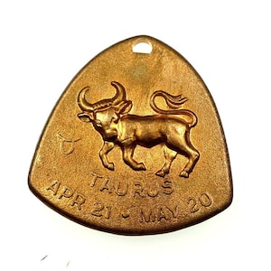 TAURUS zodiac sign pendant raw brass
