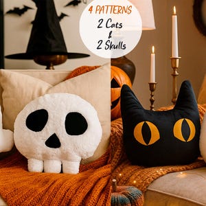 May include: Halloween cushions shaped like skulls and cats. The cushions are white and black, with orange detailing. The image includes the text "4 Patterns 2 Cats & 2 Skulls".