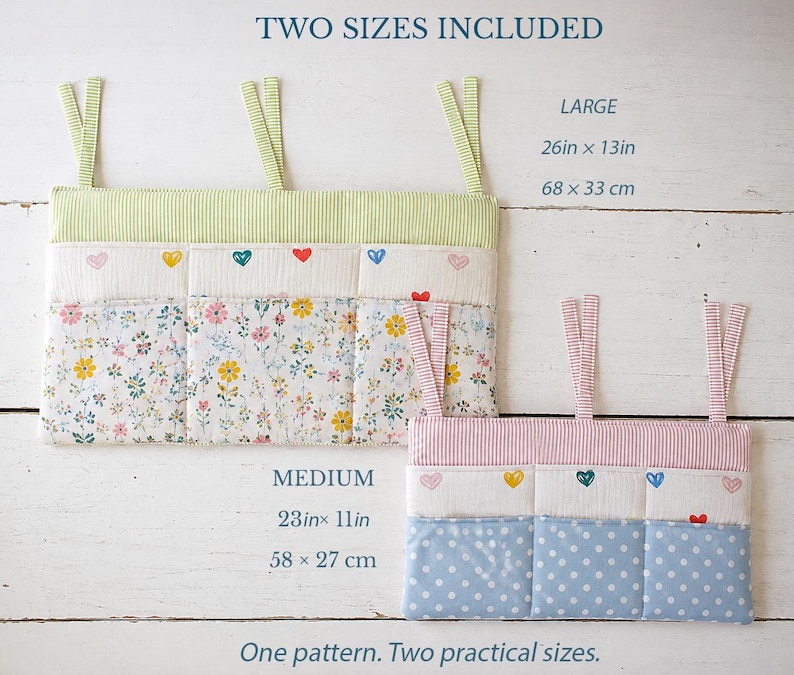 May include: Two fabric hanging organizers with three pockets each. The large organizer features green stripes and a floral print, measuring 26in x 13in. The medium organizer has pink stripes and blue polka dots, measuring 23in x 11in. Both include heart icons.