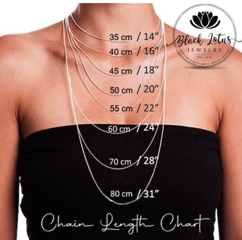 May include: A chart showing different chain lengths for necklaces, with measurements in both centimeters and inches. The chart is displayed on a model wearing a black top.