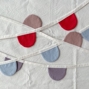 confetti half moon garland : red, dusty pink, lavender, sky blue image 1