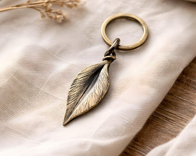 Featured listing image: Hand Forged Steel Leaf Keychain – Brass Toned Botanical Key Ring, Rustic Nature Accessory