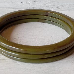 One Vintage 1920s- 1940s Green Bakelite bangles bracelets