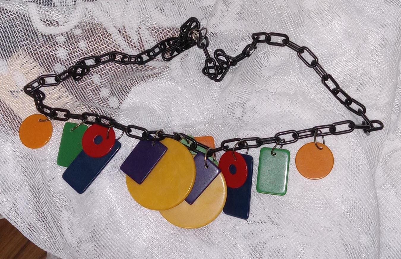 Retro 50s  Vintage lucite chain Multicolored Disc Necklace on a black celluloid chain