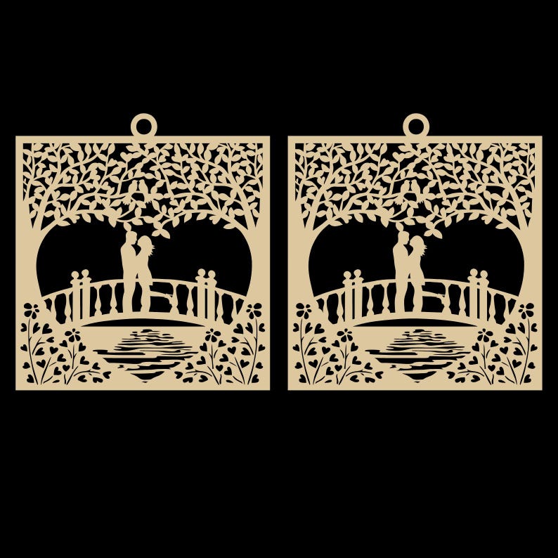 May include: Two laser-cut wooden panels featuring a romantic scene. Each panel depicts a couple embracing on a bridge under a tree, with floral and water details. The panels have a natural wood color and a small hole for hanging.